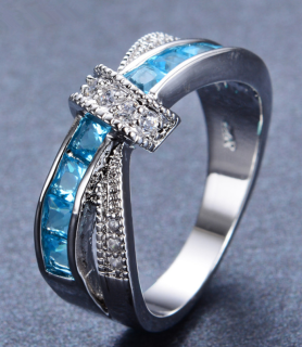 Prsten překřížený sv. modrý  vel. 9